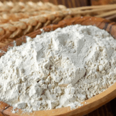 Powdered Vital Wheat Gluten in a Wooden Bowl